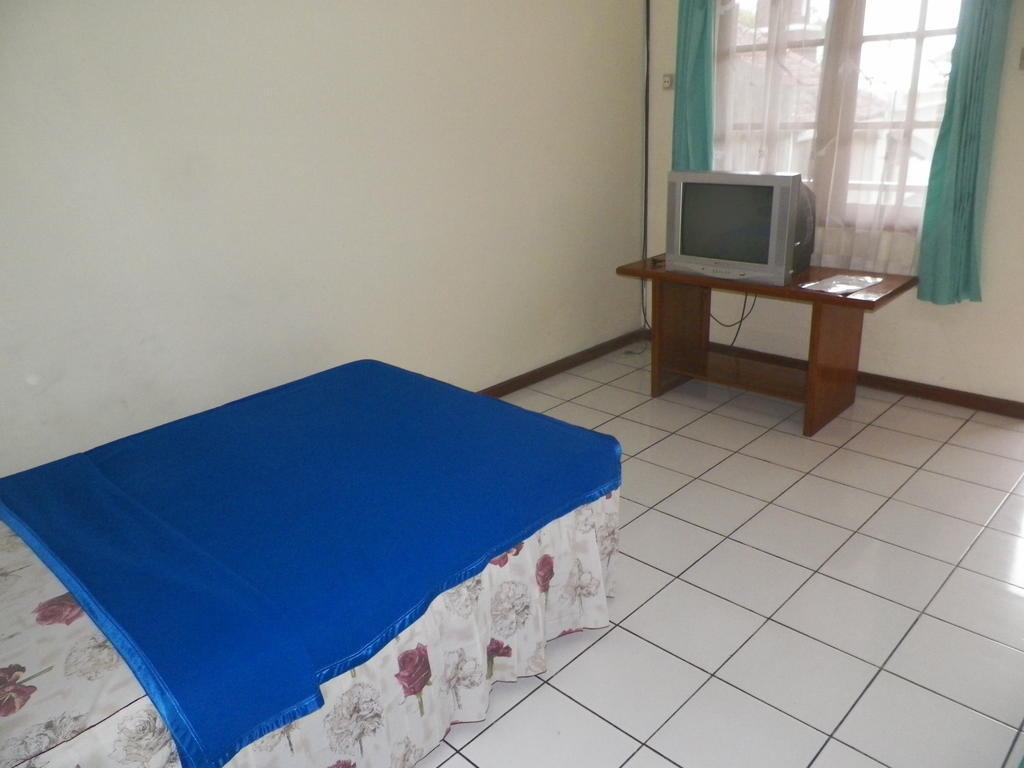 Hotel Puspa Sari Redpartner Чиатер Номер фото